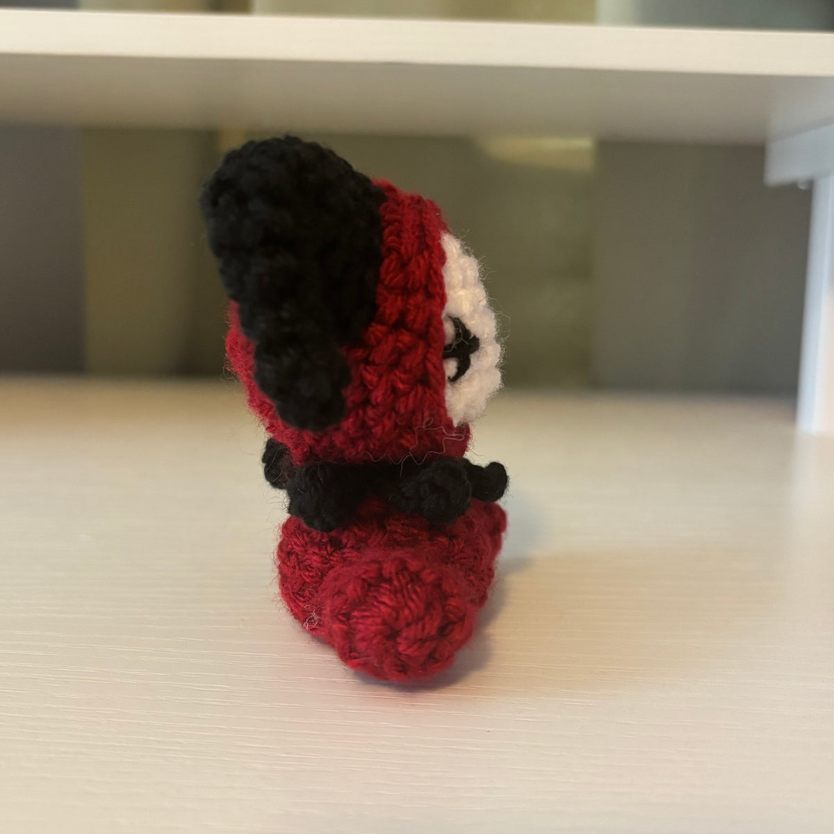 Handmade Crochet Mini Sitting Jester Plushie – Amigurumi Clown Doll in Black and Red