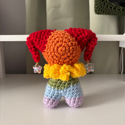 Handmade Crochet Jester Plushie – Whimsical Amigurumi Clown Doll in Rainbow with Star Charms