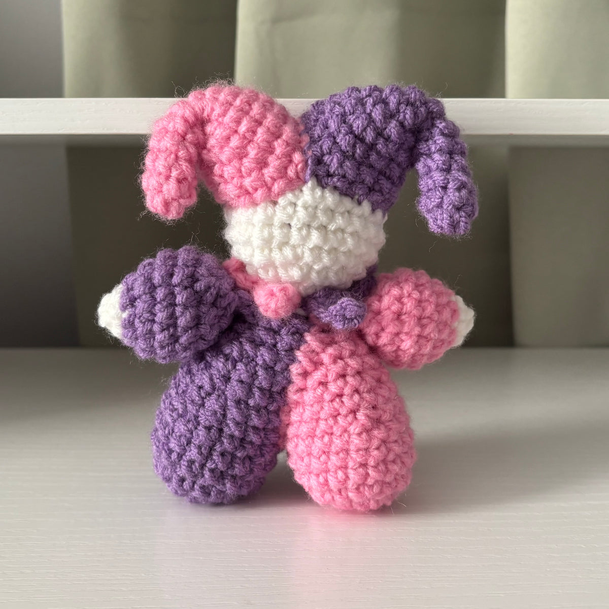 Handmade Crochet Jester Plushie – Whimsical Amigurumi Clown Doll in Purple and Pink