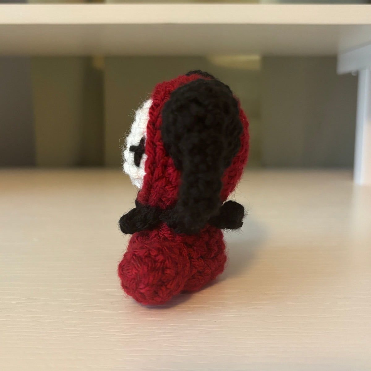 Handmade Crochet Mini Sitting Jester Plushie – Amigurumi Clown Doll in Black and Red