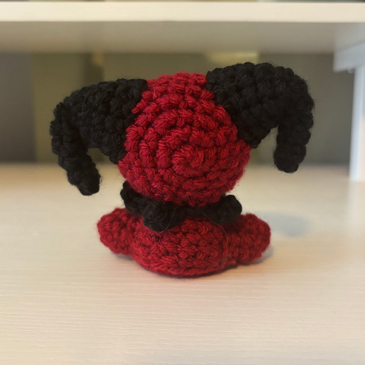Handmade Crochet Mini Sitting Jester Plushie – Amigurumi Clown Doll in Black and Red