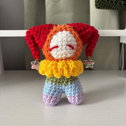 Handmade Crochet Jester Plushie – Whimsical Amigurumi Clown Doll in Rainbow with Star Charms