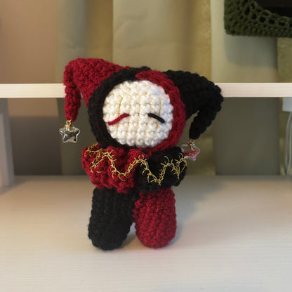 Handmade Crochet Jester Plushie – Whimsical Amigurumi Clown Doll in Black and Red with Star Charms