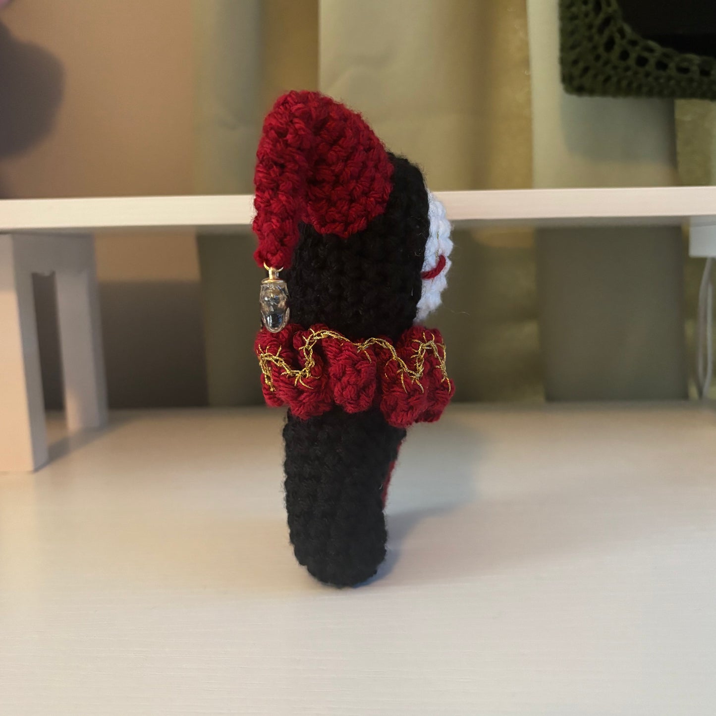 Handmade Crochet Jester Plushie – Whimsical Amigurumi Clown Doll in Black and Red with Star Charms