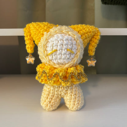 Handmade Crochet Jester Plushie – Whimsical Amigurumi Clown Doll in Yellow with Star Charms