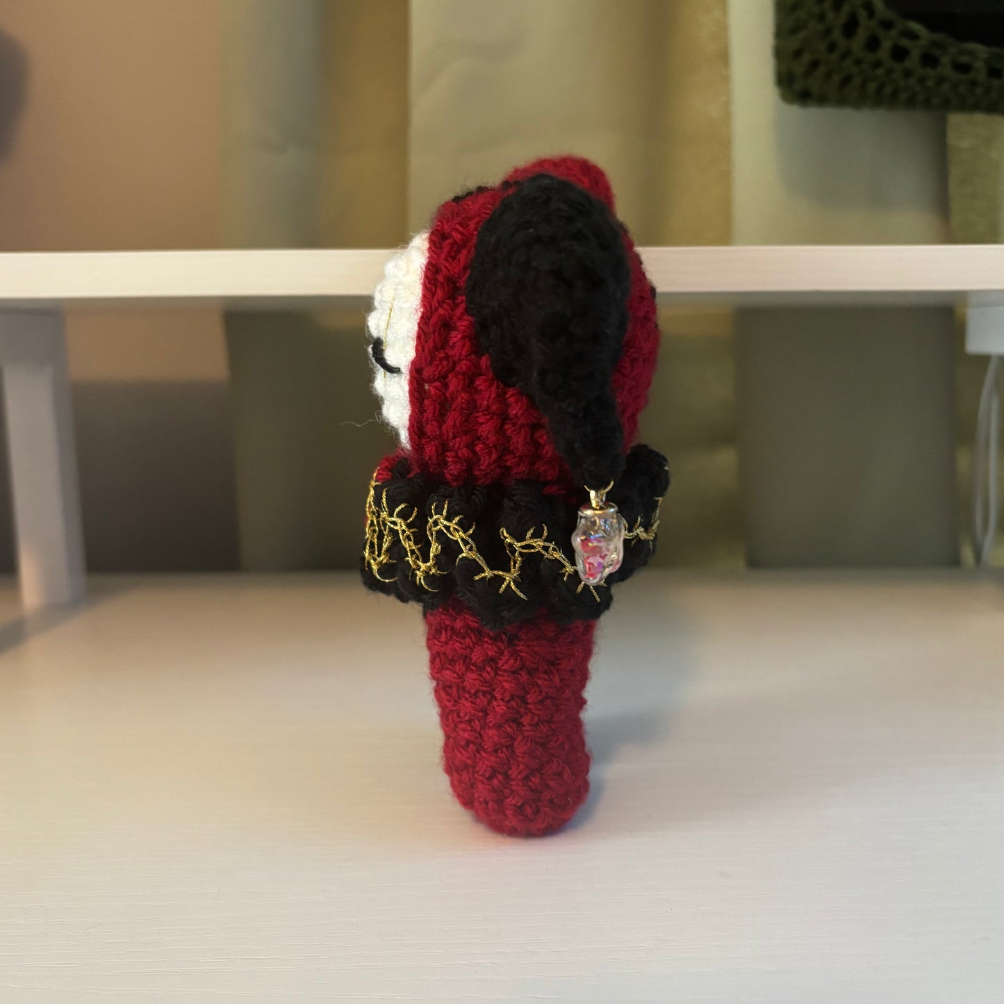 Handmade Crochet Jester Plushie – Whimsical Amigurumi Clown Doll in Black and Red with Star Charms