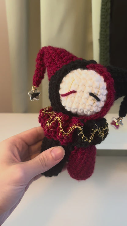 Handmade Crochet Jester Plushie – Whimsical Amigurumi Clown Doll in Black and Red with Star Charms