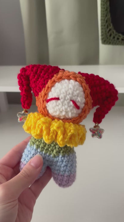 Handmade Crochet Jester Plushie – Whimsical Amigurumi Clown Doll in Rainbow with Star Charms